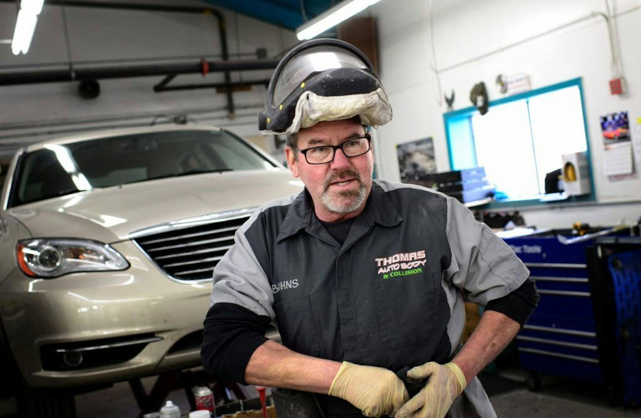 Thomas Bohnert will have to move his business, Thomas Auto Body in Crystal to accommodate the train reroute.