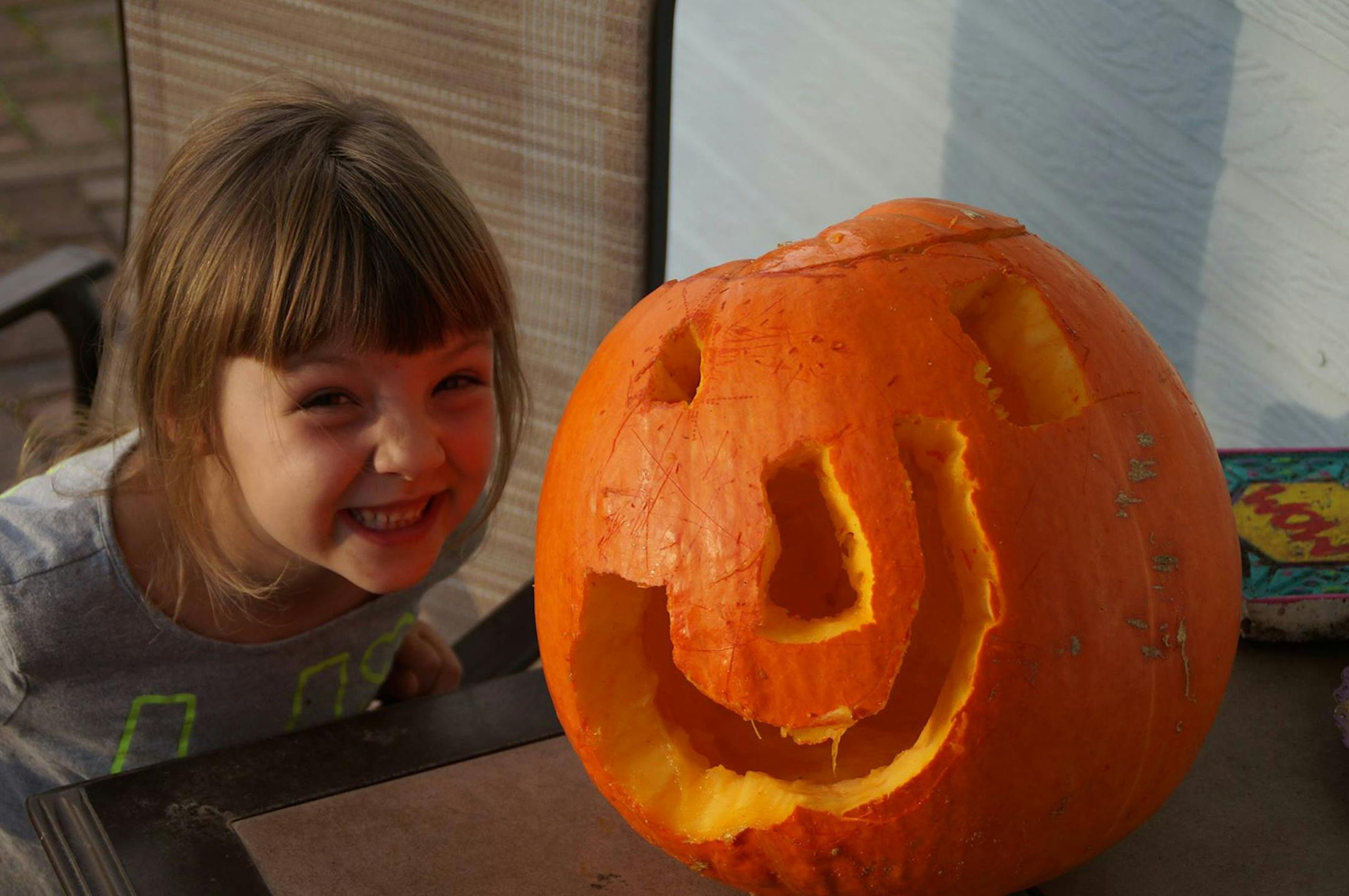 Claire Robling sent in this photo of her granddaughter, Julia Rodenz, carving her first pumpkin when she was 4. (She&#x2019;s now 6.)