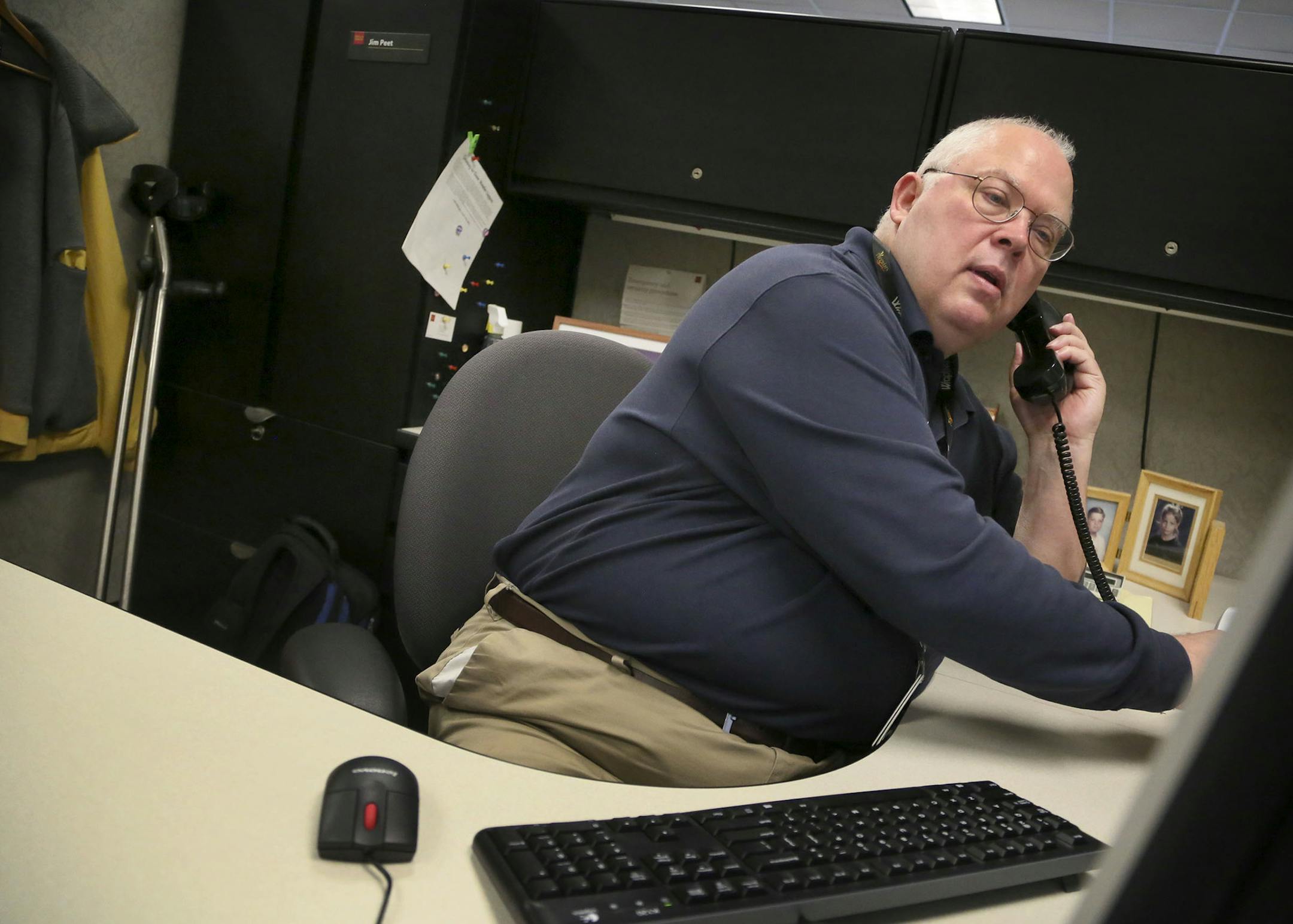 Wells Fargo business systems consultant consultant Jim Peet,who was injured in a trampoline accident in 1987, in his work space at Wells Fargo operations center Thursday Aug. 28, 2014, in Minneapolis MN.] (DAVID JOLES/STARTRIBUNE)djoles@startribune Minnesota employs more people than before the Great Recession, but the the unemployment rate of the able-to-work developmently disabled remmains 25 percent-plus. Here are the issues and f ew solutions embodied in several can-do workers who bring insig