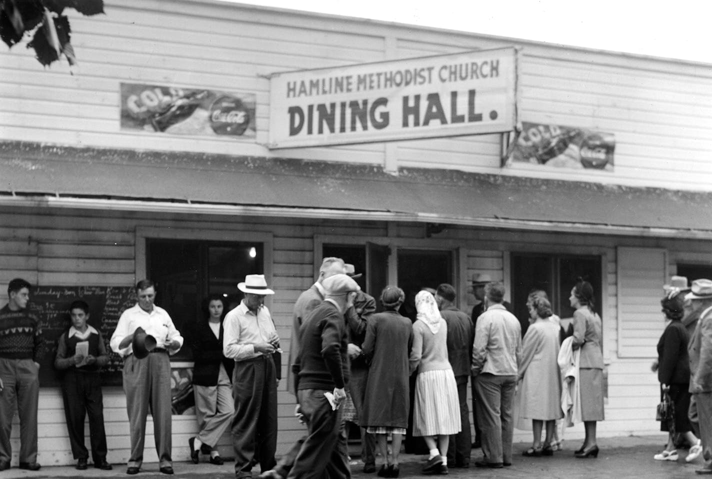 Photo provided by the Minnesota State Fair People entering (and leaving) the Hamline Methodist Church Dining Hall in 1940.