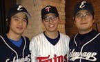 Sangho Yun, center, is a Twins fan. His buddies, Kiwoong You, left, and Kwan Hyun Kim play for a Korean amateur team.