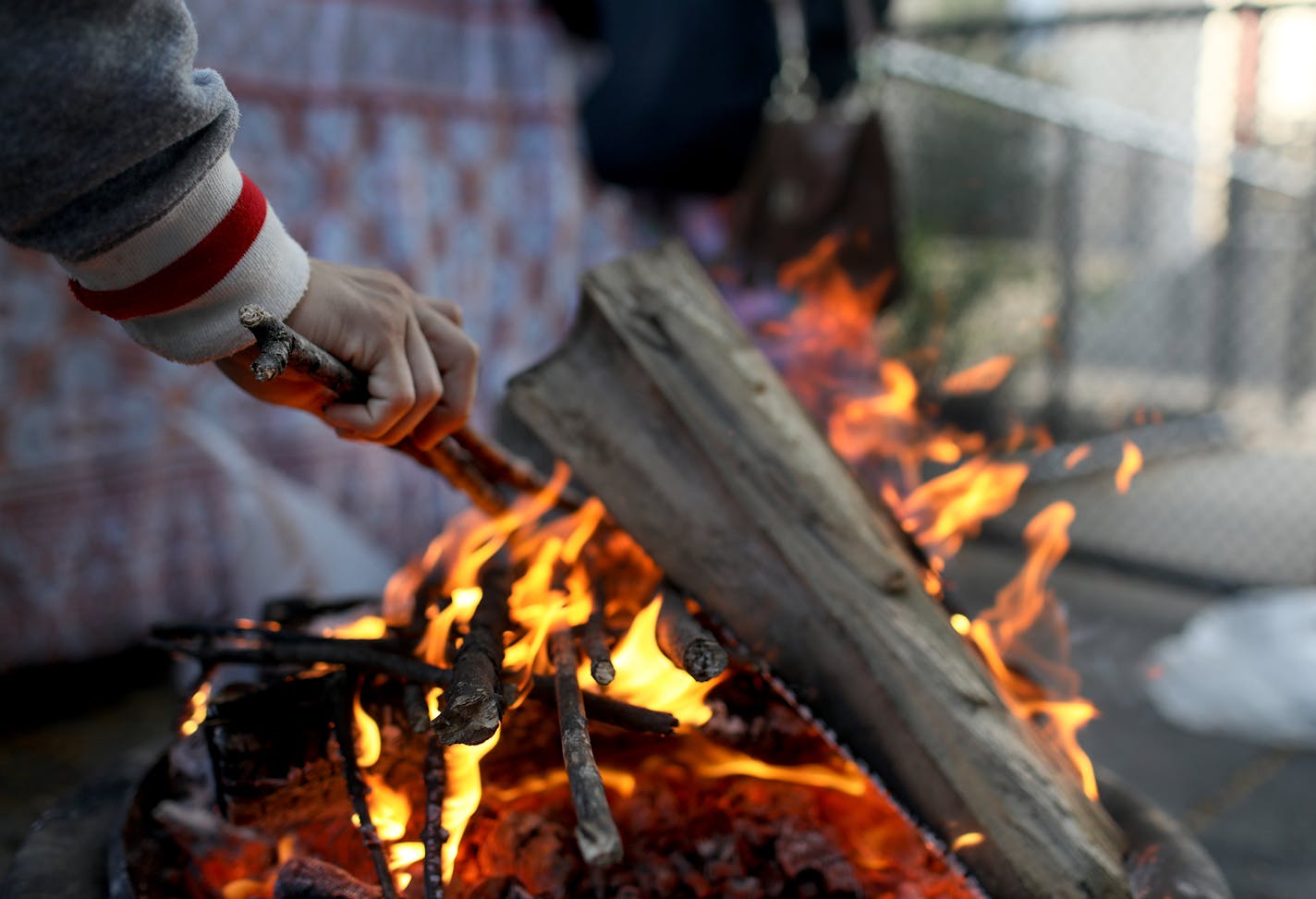 Family members of Pamela Rivera, 51, built a sacred "spirit fire" in Little Earth on Sunday, after Rivera died of an apparent drug overdose. A spirit fire is an American Indian spiritual tradition that is believed to help a person's spirit join their ancestors after death.