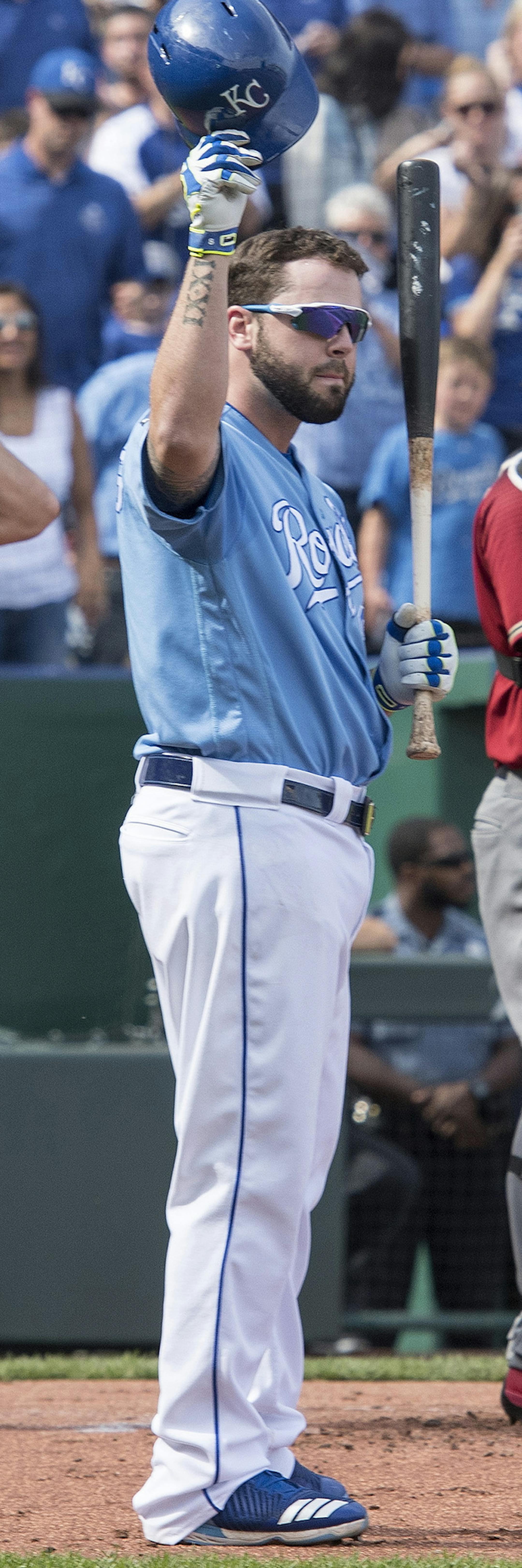 Kansas City Royals' Mike Moustakas tips his hat to the cheering crowd before his at bat in the first inning against the Arizona Diamondbacks on Sunday, Oct. 1, 2017 at Kauffman Stadium in Kansas City, Mo. (John Sleezer/Kansas City Star/TNS) ORG XMIT: 1212334