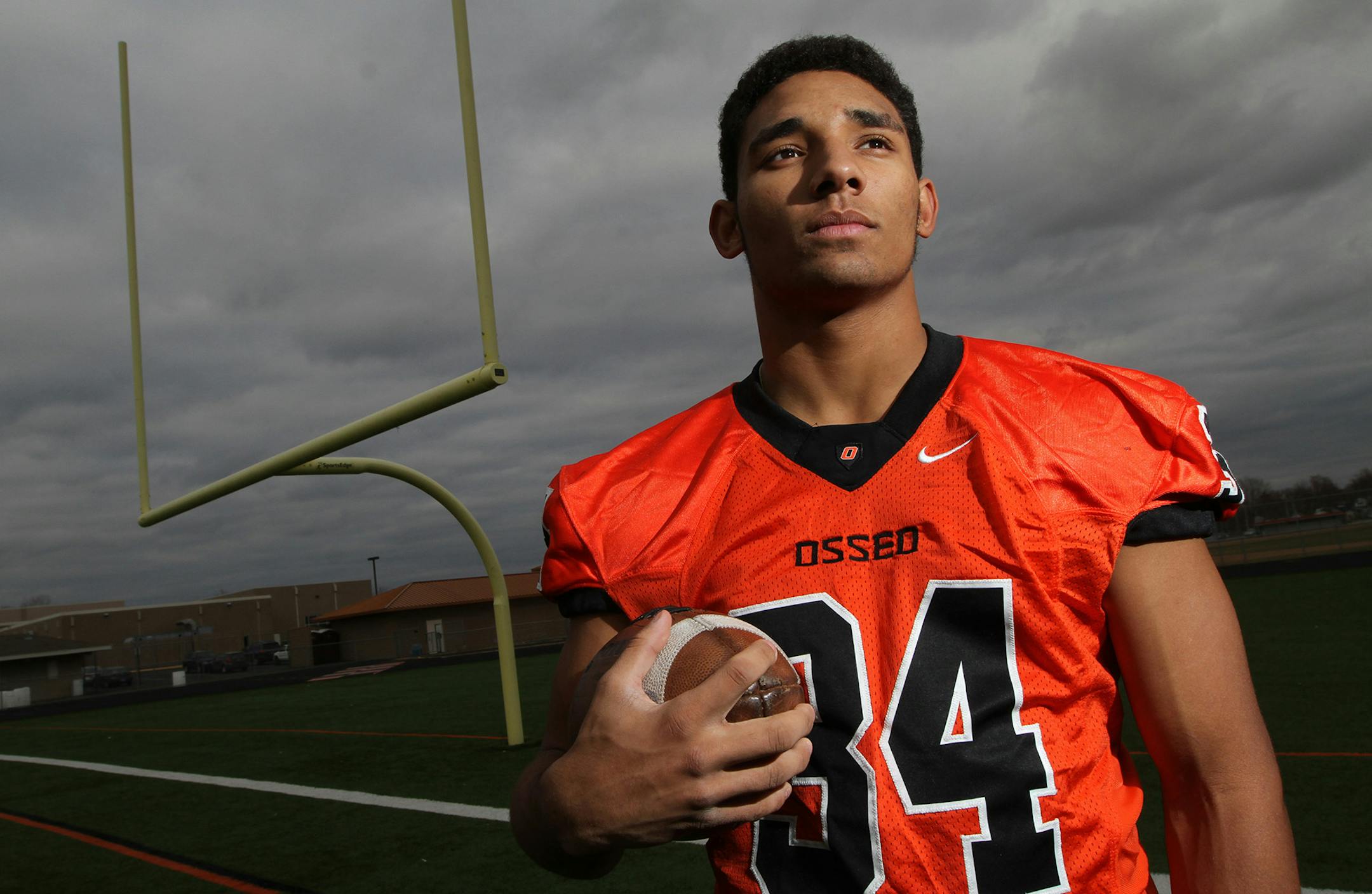 Star Tribune 2012 Metro Player of the Year in Football, Bridge Tusler was photographed on 11/7/12 at the Osseo High School Football field. Bruce Bisping/Star Tribune bbisping@startribune.com Bridge Tusler/source. ORG XMIT: MIN1211071719508117