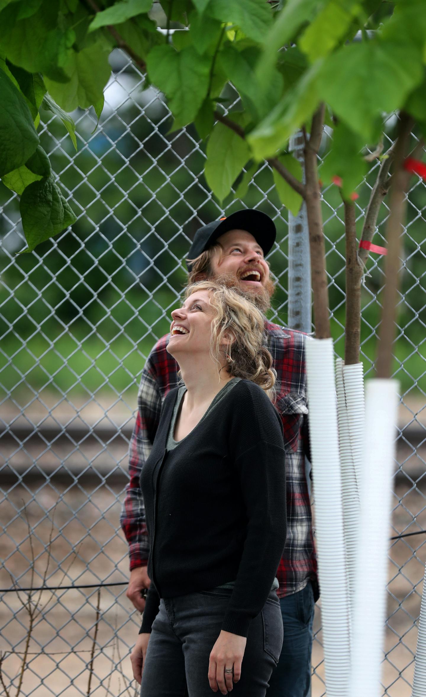 A hybrid mission
Signa Weise and Anders Erickson searched for a tree for their Minneapolis yard at Tree Trust's lottery. The nonprofit focuses on the environment and job training.