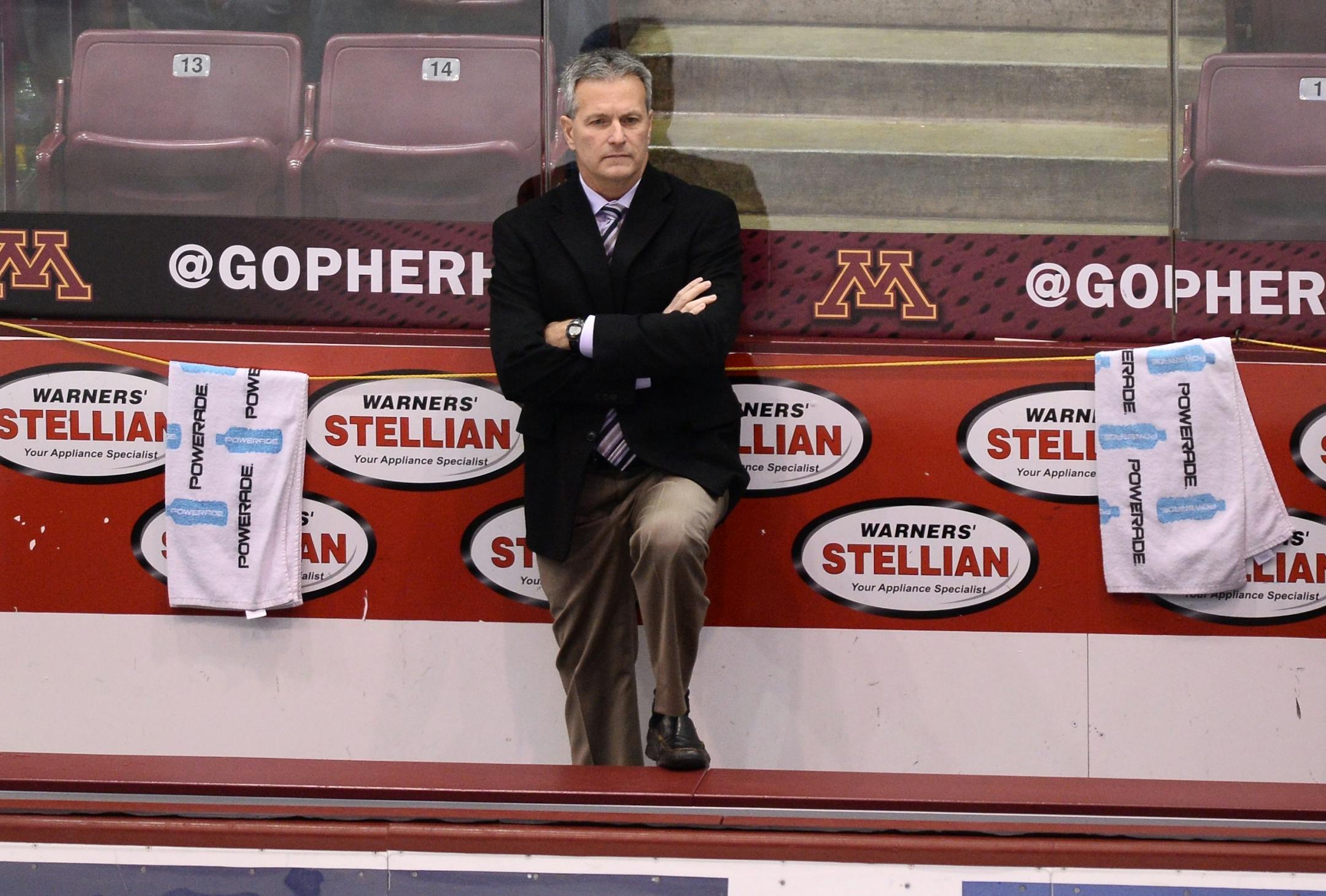 Minnesota Golden Gophers head coach Don Lucia watched the team before the puck dropped against the Penn State Nittany Lions Friday night.
