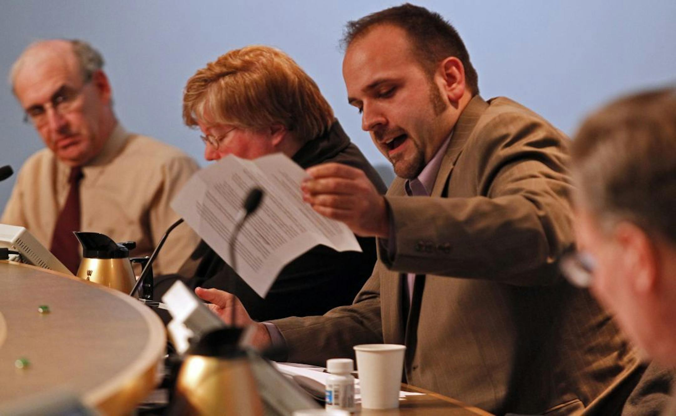 Park Board commissioner Brad Bourn, center gave his reaction to the original proposal of creating a dog park in Martin Luther King park.