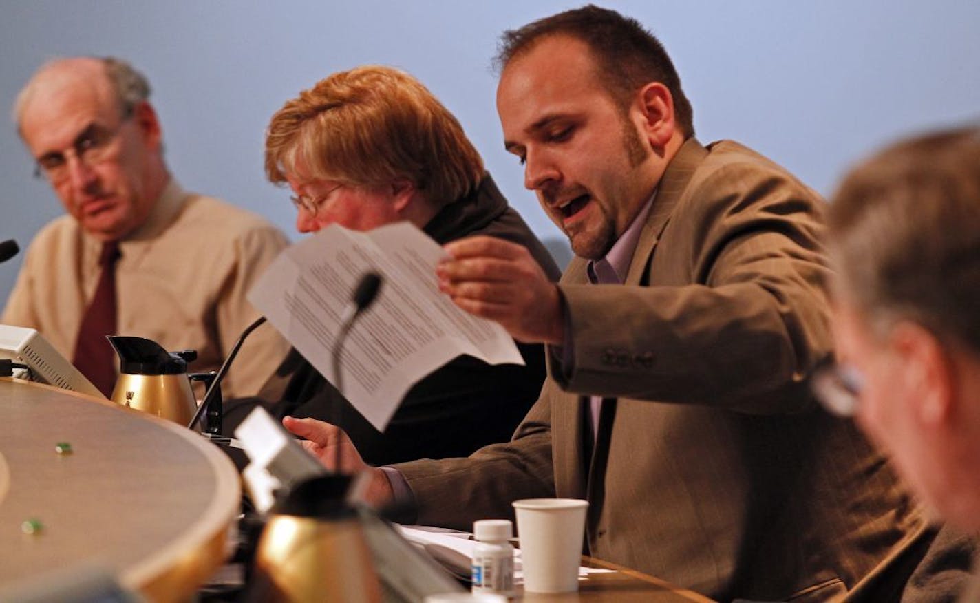 Park Board commissioner Brad Bourn, center gave his reaction to the original proposal of creating a dog park in Martin Luther King park.