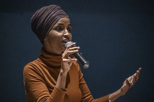 Rep. Ilhan Omar speaks at a town hall meeting at the Colin Powell Center in Minneapolis. (Richard Tsong-Taatarii/Minneapolis Star Tribune/TNS) ORG XMIT: 1666321