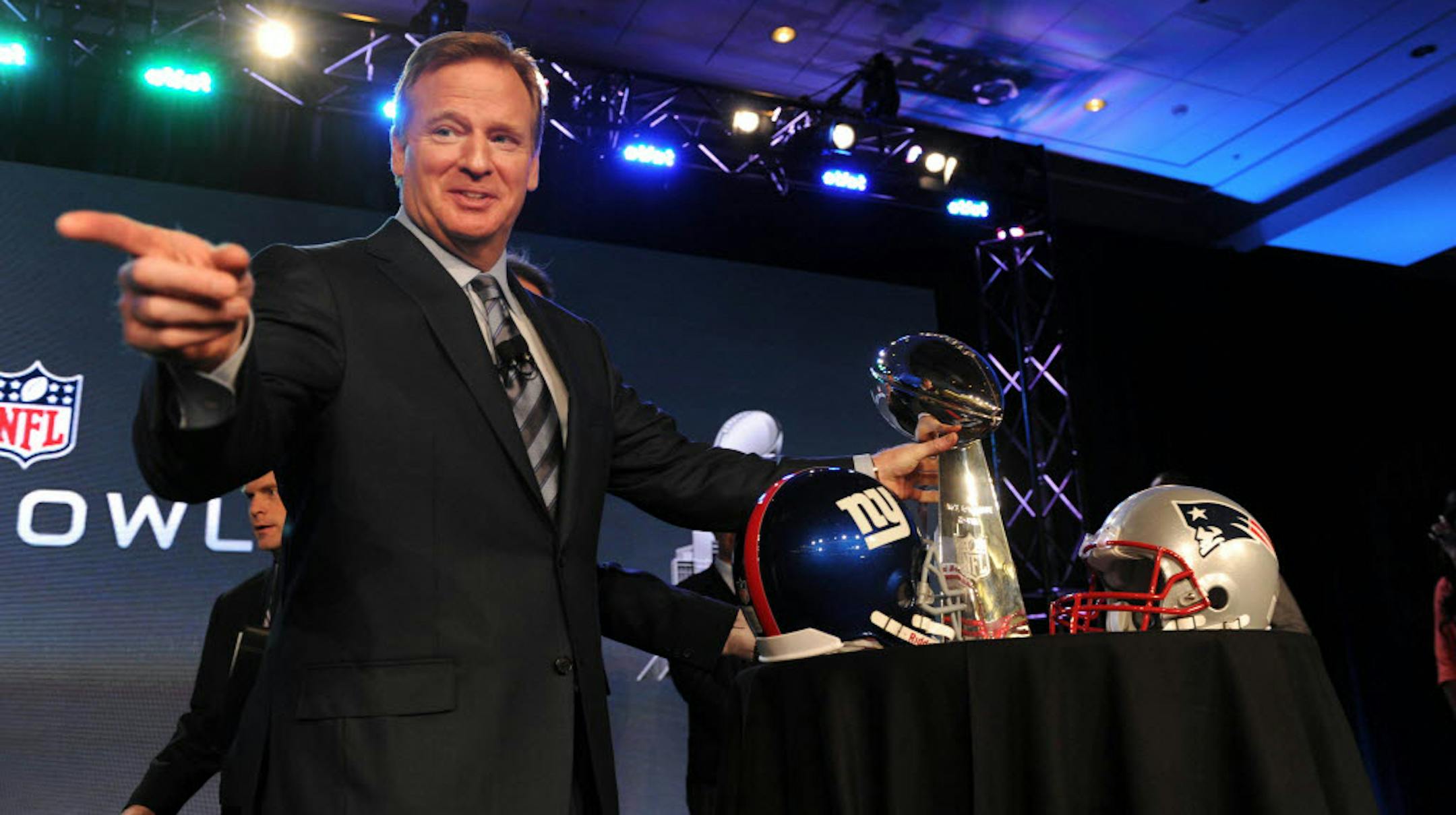 NFL Commissioner Roger Goodell with the Vince Lombardi Trophy at the annual pre-Super Bowl news conference.