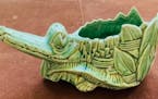 This McCoy pottery alligator is worth about $70.