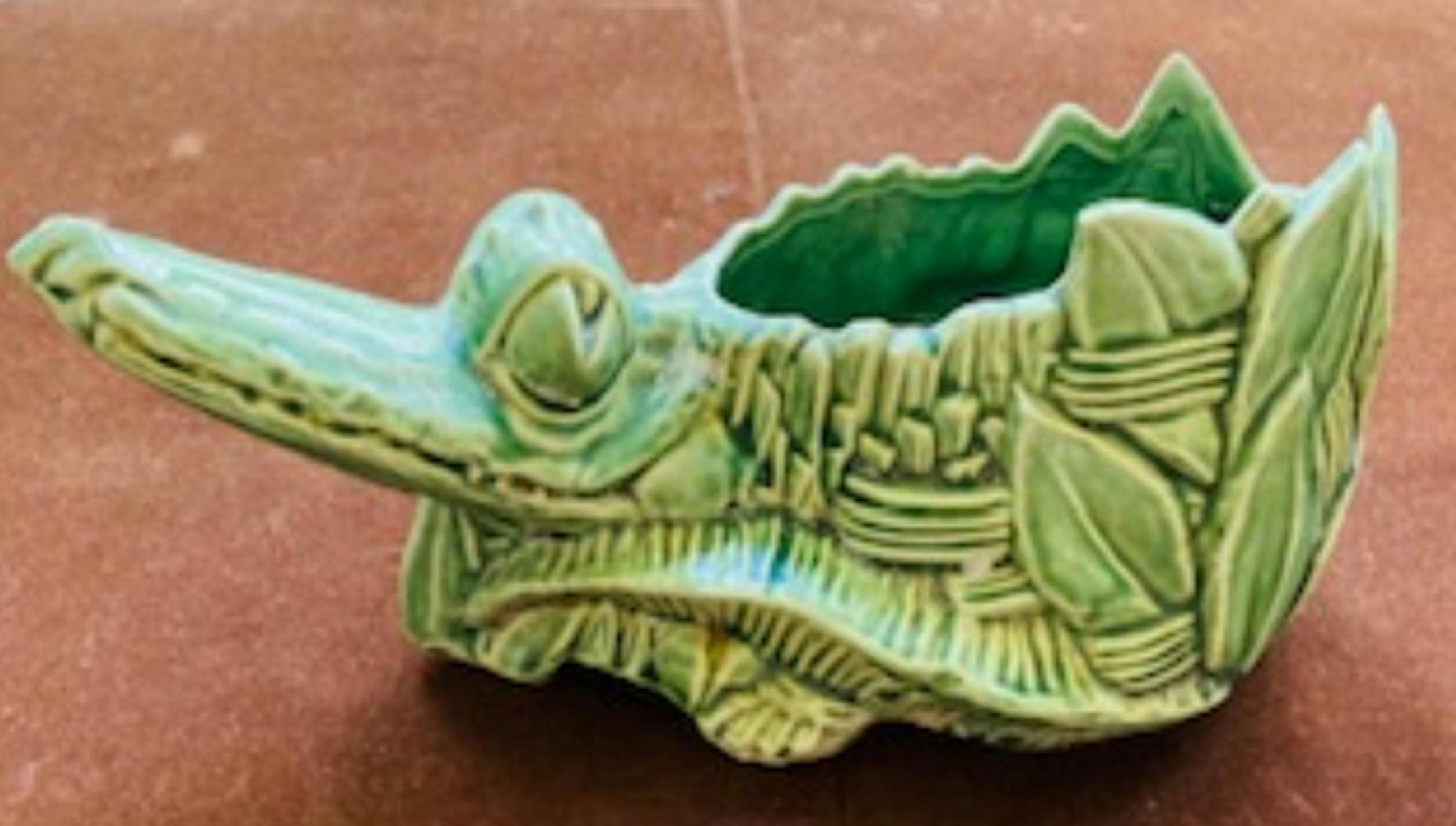 This McCoy pottery alligator is worth about $70.