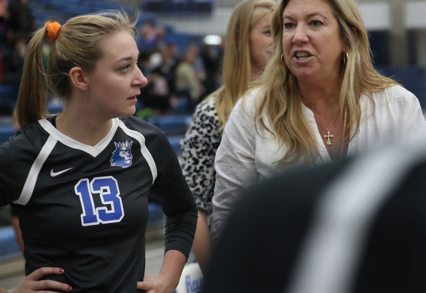 Hopkins junior setter Tara Lee and her aunt Vicki Seliger Swenson enclose a close and intense relationship during games.] Hopkins junior setter Tara Lee had her mother murdered in a highly-publicized domestic violence incident 10 years ago. Her aunt, Hopkins coach Vicki Seliger Swenson and husband Erik Swenson, took Tara and her siblings in and raised them. Tara is now the starting setter for Hopkins, one of the best teams in the state.Richard Tsong-Taatarii/rtsong-taatarii@startribune.com