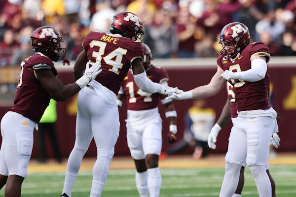 Gophers defensive end Boye Mafe (34) will be tasked with slowing down the Badgers on Saturday.