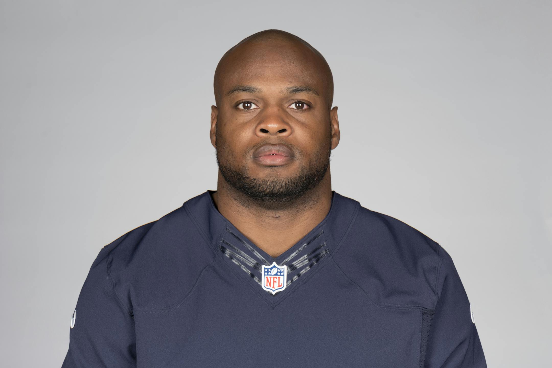 FILE - This is a 2017 photo showing Jerrell Freeman of the Chicago Bears NFL football team. Bears linebacker Jerrell Freeman saved a man from choking at a Texas airport over the weekend. Freeman tells the Chicago Tribune that he was eating at a restaurant in the Austin airport while awaiting a flight to Chicago on Sunday, July 23, 2017, when he noticed a man frantically running around a neighboring table. A woman recognized the man was choking and tried the Heimlich maneuver, but Freeman says sh