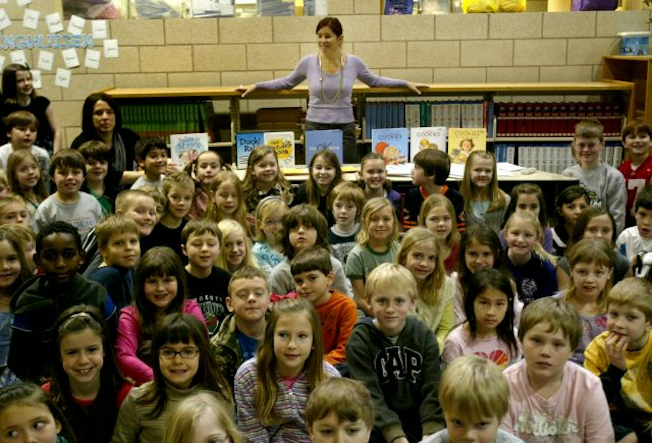 Amy Krouse Rosenthal posed with the third grade classes at Bluff Creek Elementary School in Chanhassen, MN.