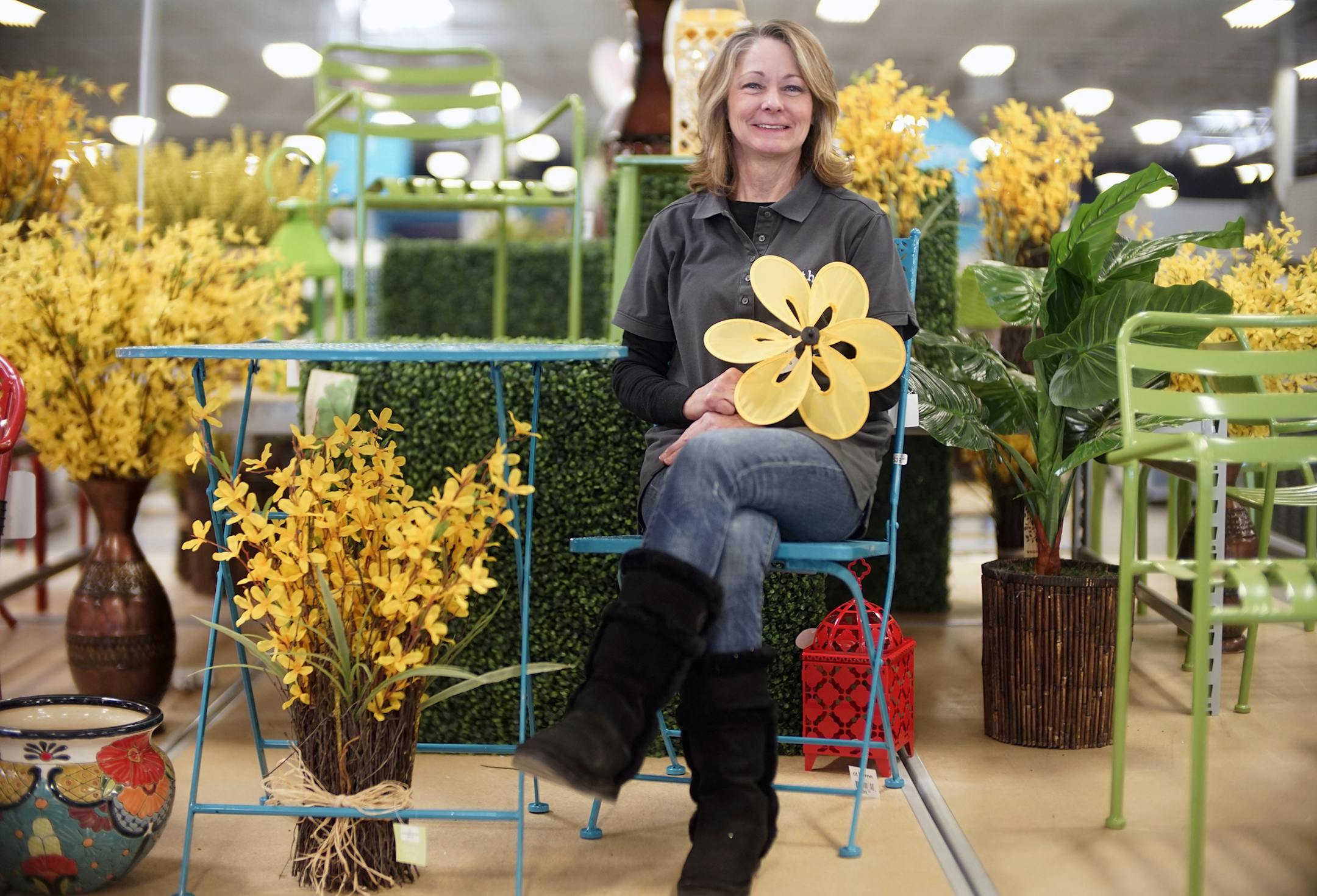 Brenda Fox, store director of of "At Home" has a large selection of patio furniture and cushions.] rtsong-taatarii@startribune.com/ Richard Tsong-Taatarii
