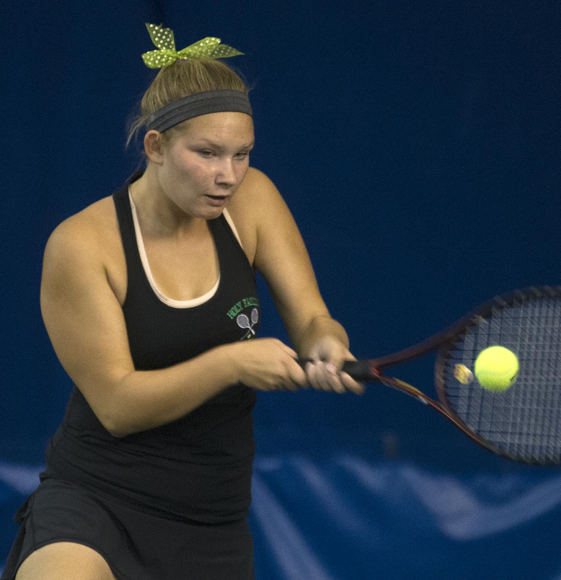 Holy Family's Grace Sperr makes a return Wednesday evening. Sperr won a marathon match Wednesday evening to send Holy Family to the finals. ] (Matthew Hintz, 102214, Minneapolis)