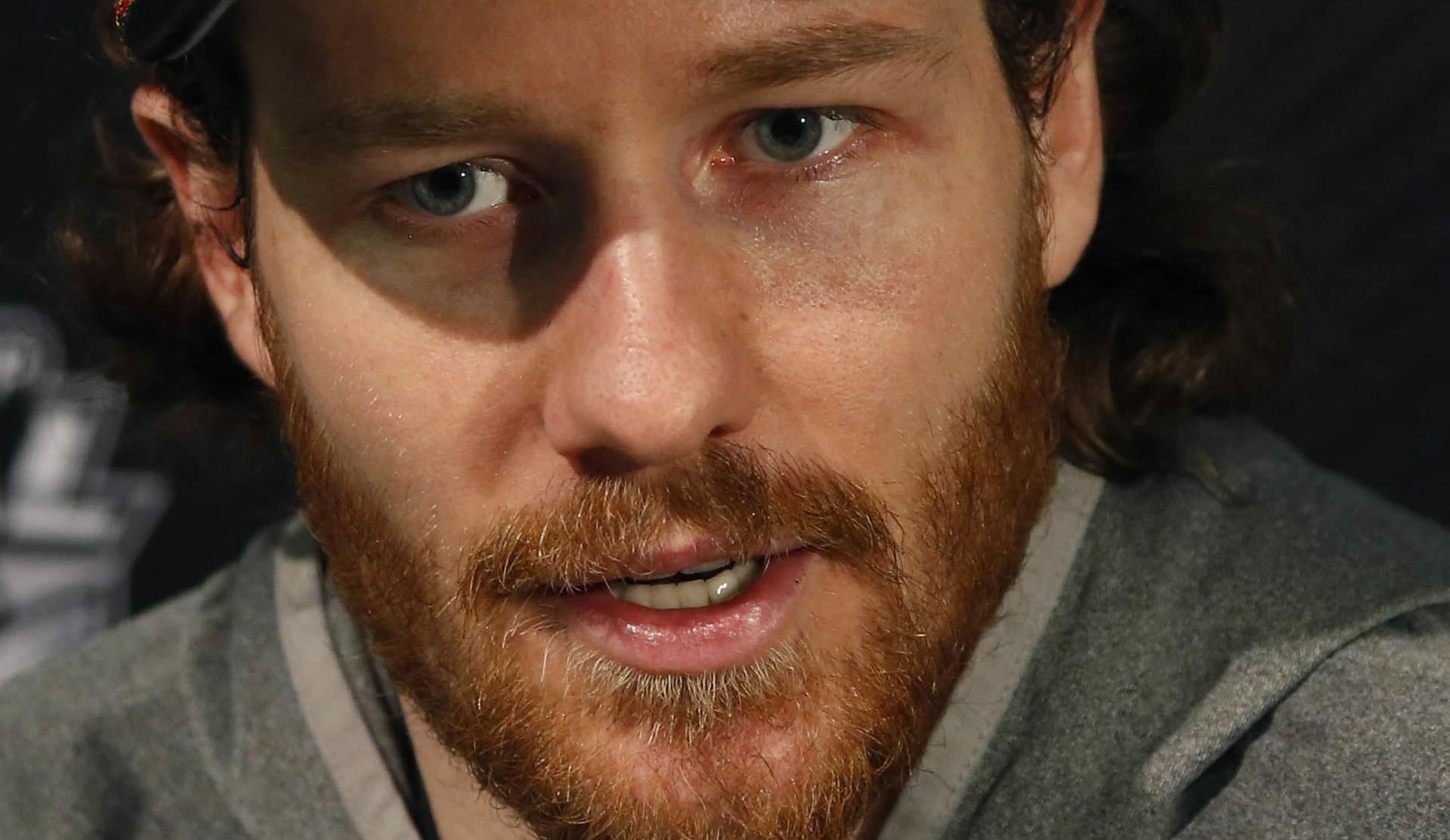 Chicago Blackhawks defenseman Duncan Keith responds to a question during a news conference for the Stanley Cup Final hockey against the Boston Bruins Tuesday, June 11, 2013 in Chicago. The first game of the Stanley Cup final series is Wednesday in Chicago. (AP Photo/Charles Rex Arbogast) ORG XMIT: MIN2013061120482500
