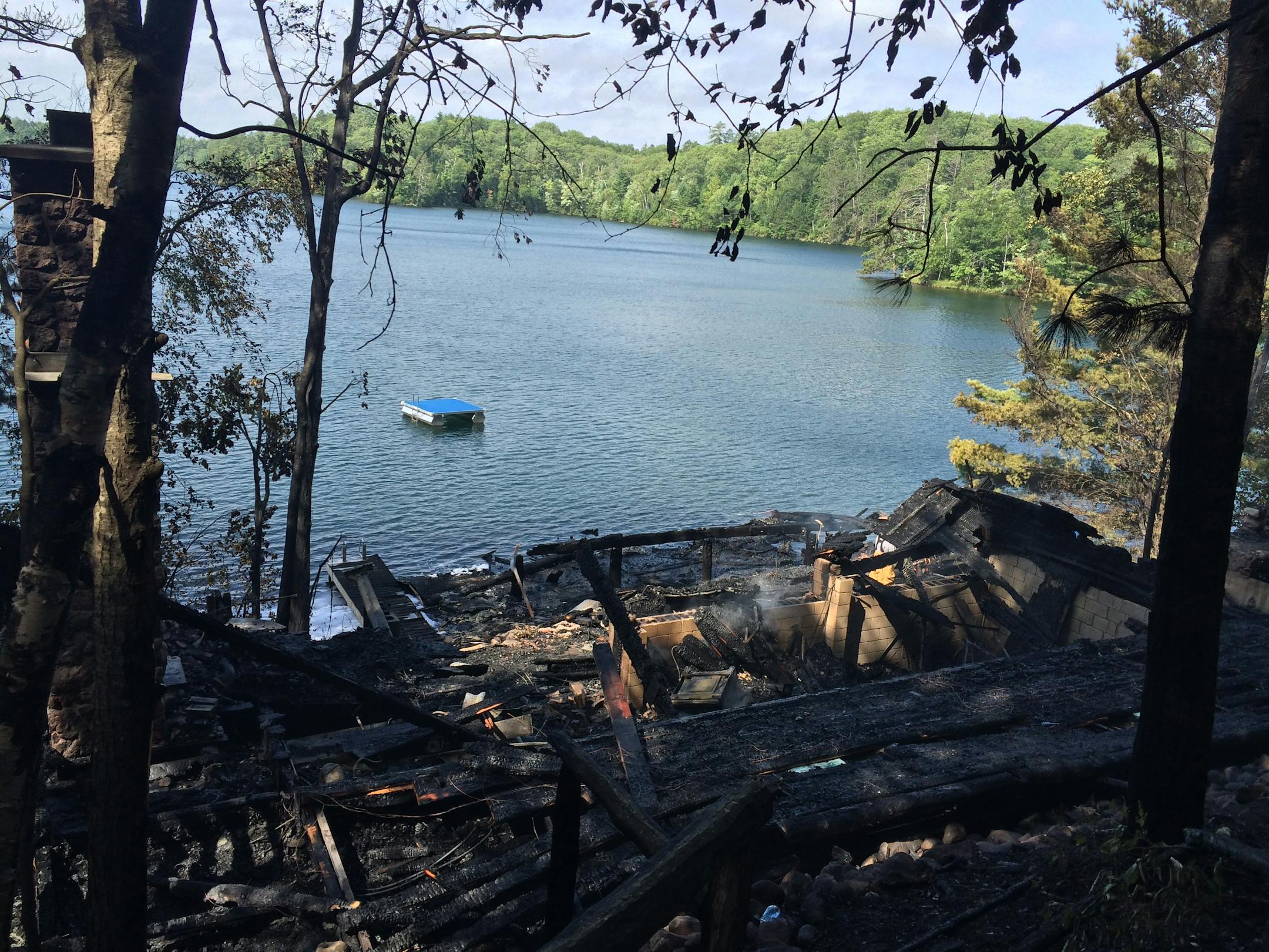 The wilderness cabin of Wild owner Craig Leipold burned to the ground this summer during a management retreat. Photo from the iPhones of the Wild staff.