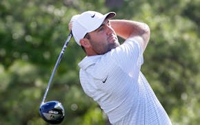 Scottie Scheffler teed off on the first hole during the first round of the Houston Open on Thursday. He is tied for the lead through three rounds.
