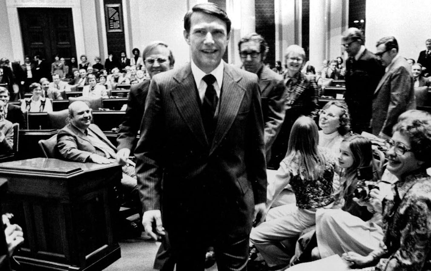 January 5, 1977 Martin Sabo was escorted to the rostrum after he was reelected speaker of the Minnesota House Tuesday. At right were Sabo's daughters and his secretary. The DFL-dominated Minnesota Senate expanded Majority Leader Nicholas Coleman's powers Tues&#x2260;day despite the protests of the smallest Independent-Republican contingent in the chamber's his&#x2260;tory. The majority voted to create two rules subcommittees on bill sched&#x2260;uling and committees, both head&#x2260;ed by Colem