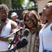 Ricky Cobb’s twin brother Rashad Cobb, left, mother Nyra Fields-Miller, center, and sister Octavia Ruffin stand together at a news conference on Aug