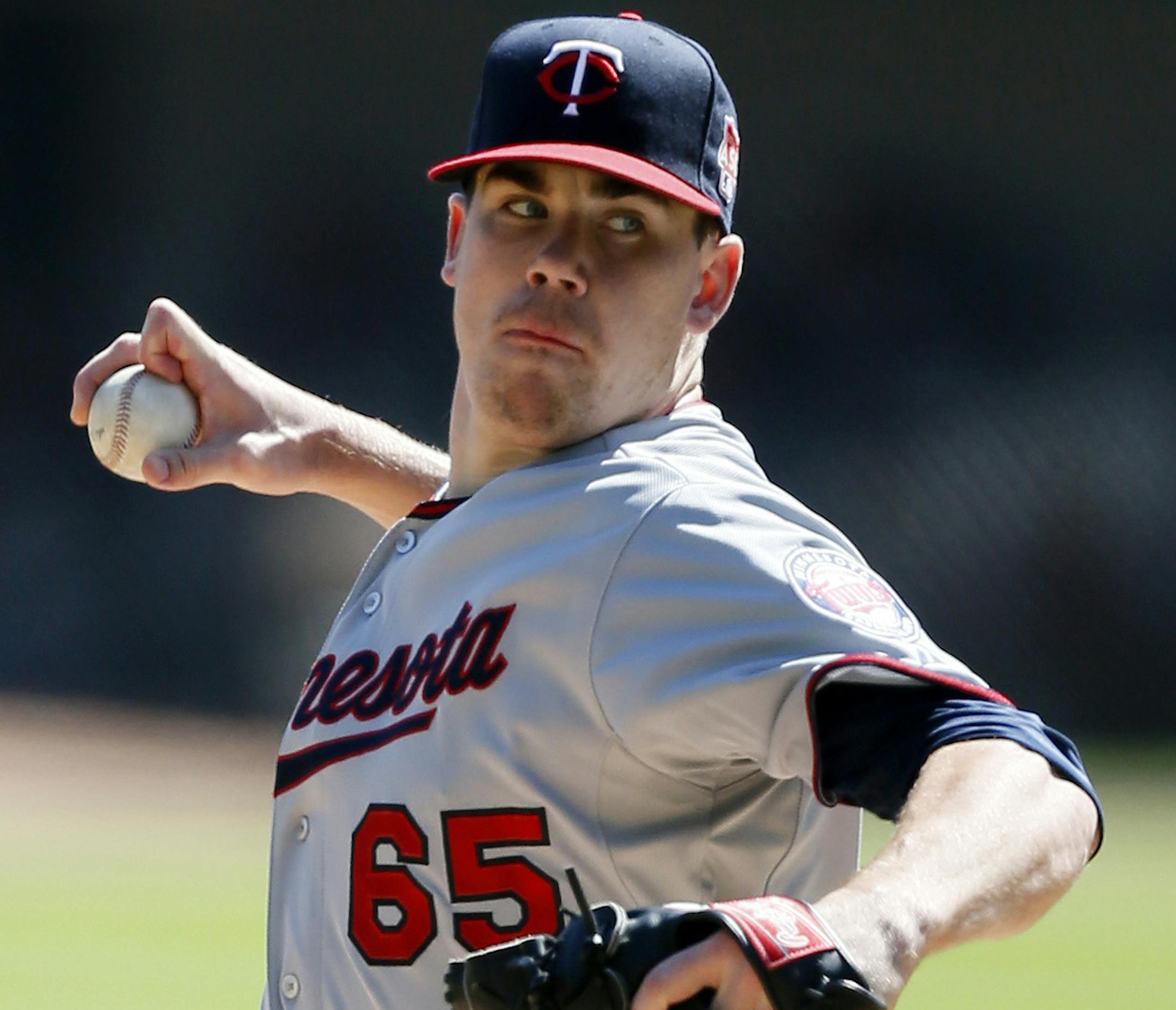 Minnesota Twins starting pitcher Trevor May delivers against the Chicago White Sox during the first inning of a baseball game Sunday, Sept. 14, 2014, in Chicago. (AP Photo/Andrew A. Nelles) ORG XMIT: MIN2014091416374627 ORG XMIT: MIN1409141640331284