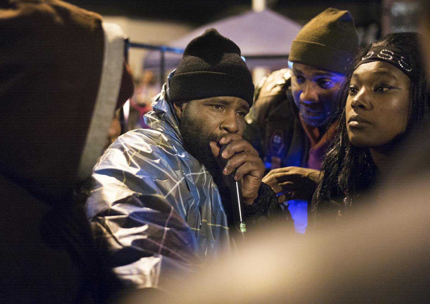 At the 4th Police Precinct, protesters including Jermaine Robinson demanded answers over the shooting of his brother Jamar Clark.]Richard Tsong-Taatarii/rtsong-taatarii@startribune.com