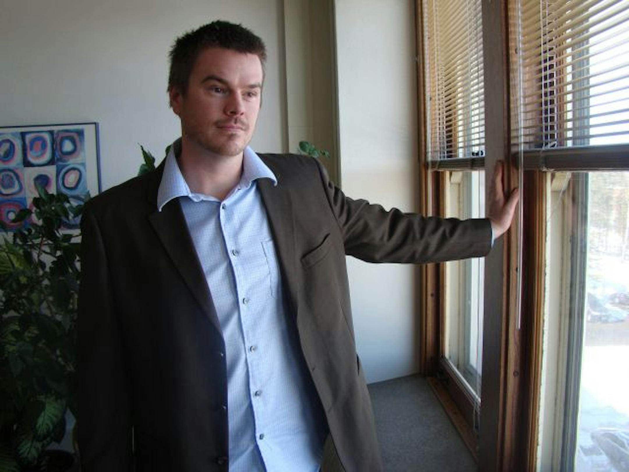 Ryan Vine, poet and St. Scholastica professor