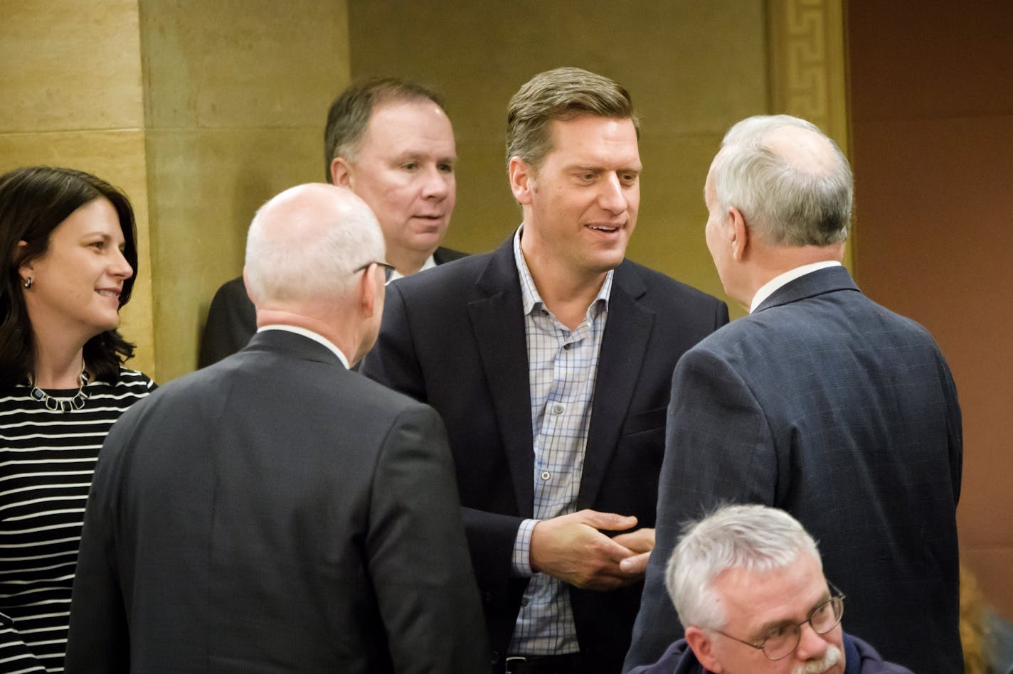 House Speaker Kurt Daudt and Republican House leaders waited by the door to greet Governor Mark Dayton as he left the budget announcement press conference.