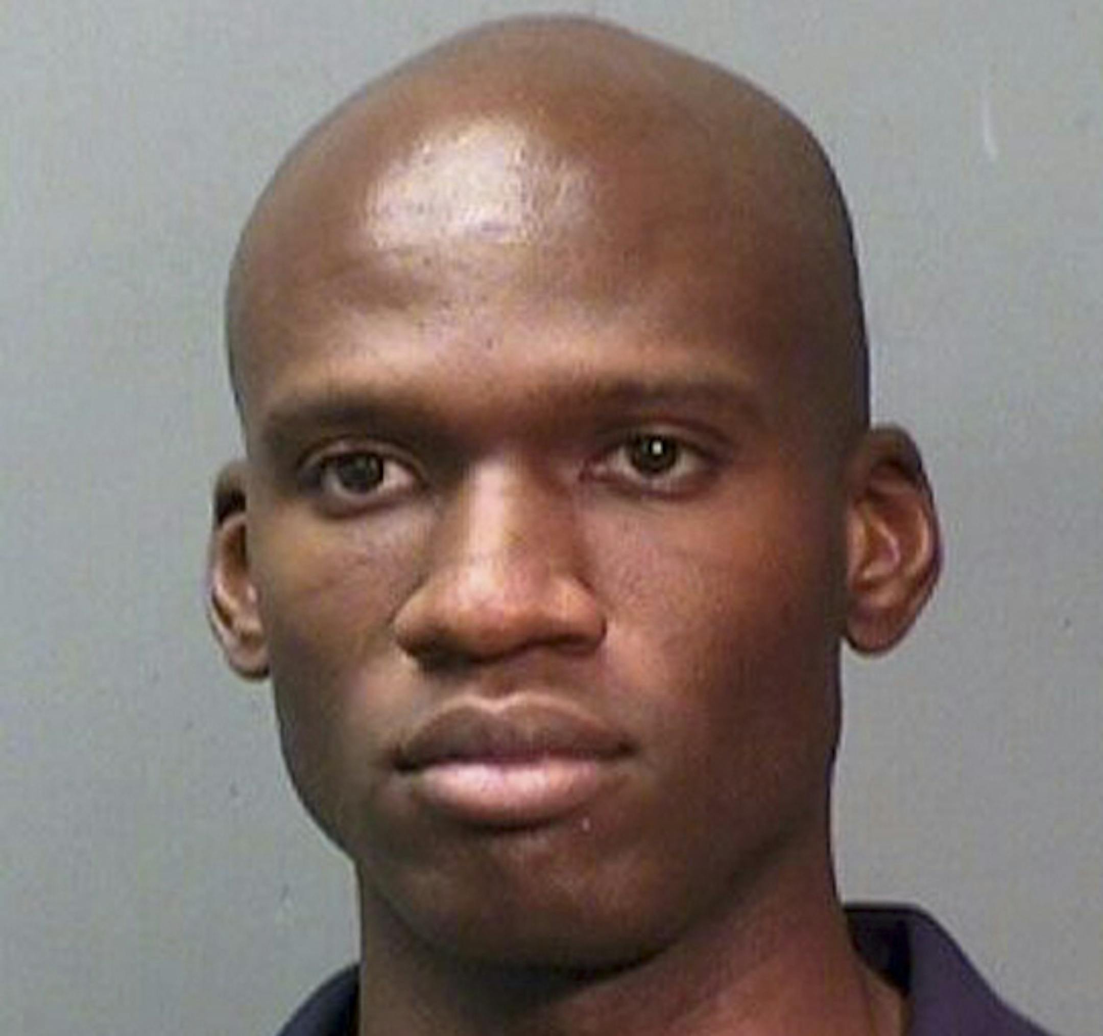 A 2010 booking photo of Aaron Alexis released by the Fort Worth Police Department on Monday, Sept. 16, 2013. Law enforcement officials on Tuesday were trying to piece together a motive for a shooting rampage by the former Navy reservist at the secure military facility near the Capitol on Monday that left at least 13 people dead, including the gunman Alexis, who the police say acted alone. (Fort Worth Police Department via the New York Times) -- FOR EDITORIAL USE ONLY