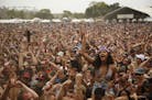 The crowd cheers at Soundset in 2014.