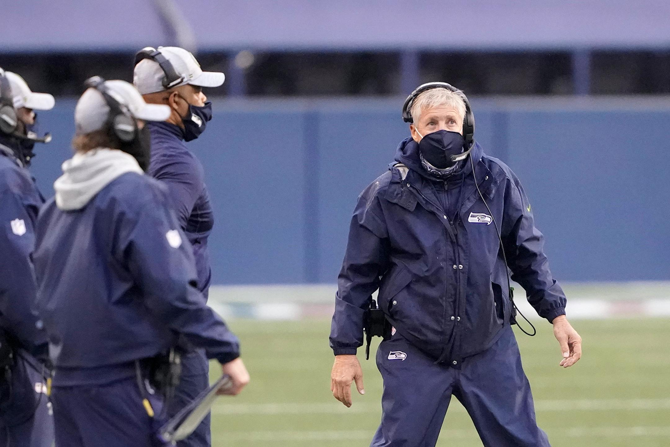 Seattle Seahawks head coach Pete Carroll looks on from the sideline during the first half of an NFL football game against the Minnesota Vikings, Sunday, Oct. 11, 2020, in Seattle. (AP Photo/Ted S. Warren)
