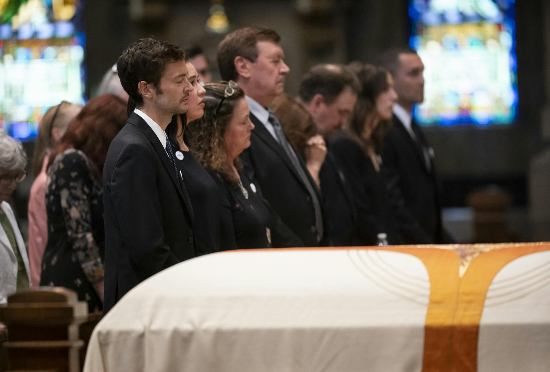 Justin Grunewald, husband of Gabe Grunewald, prayed during her funeral at the Basilica of St. Mary in Minneapolis.