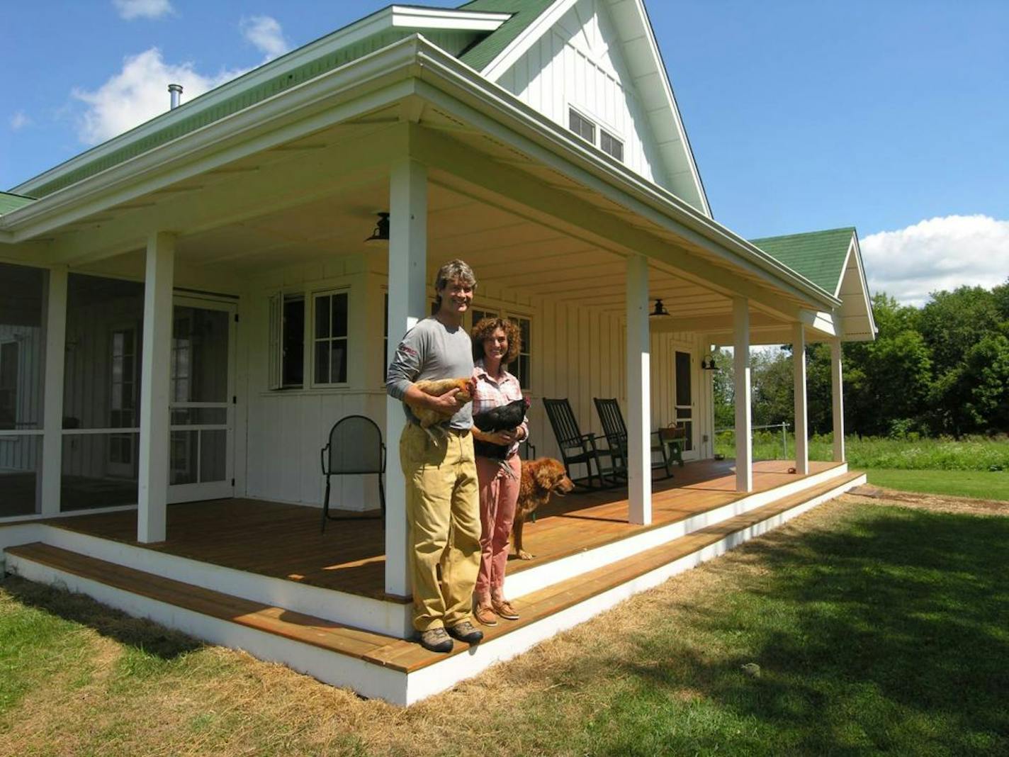 Rick and Patti Dougherty outside their Holly Ridge Farmhouse in Ellsworth Wis.