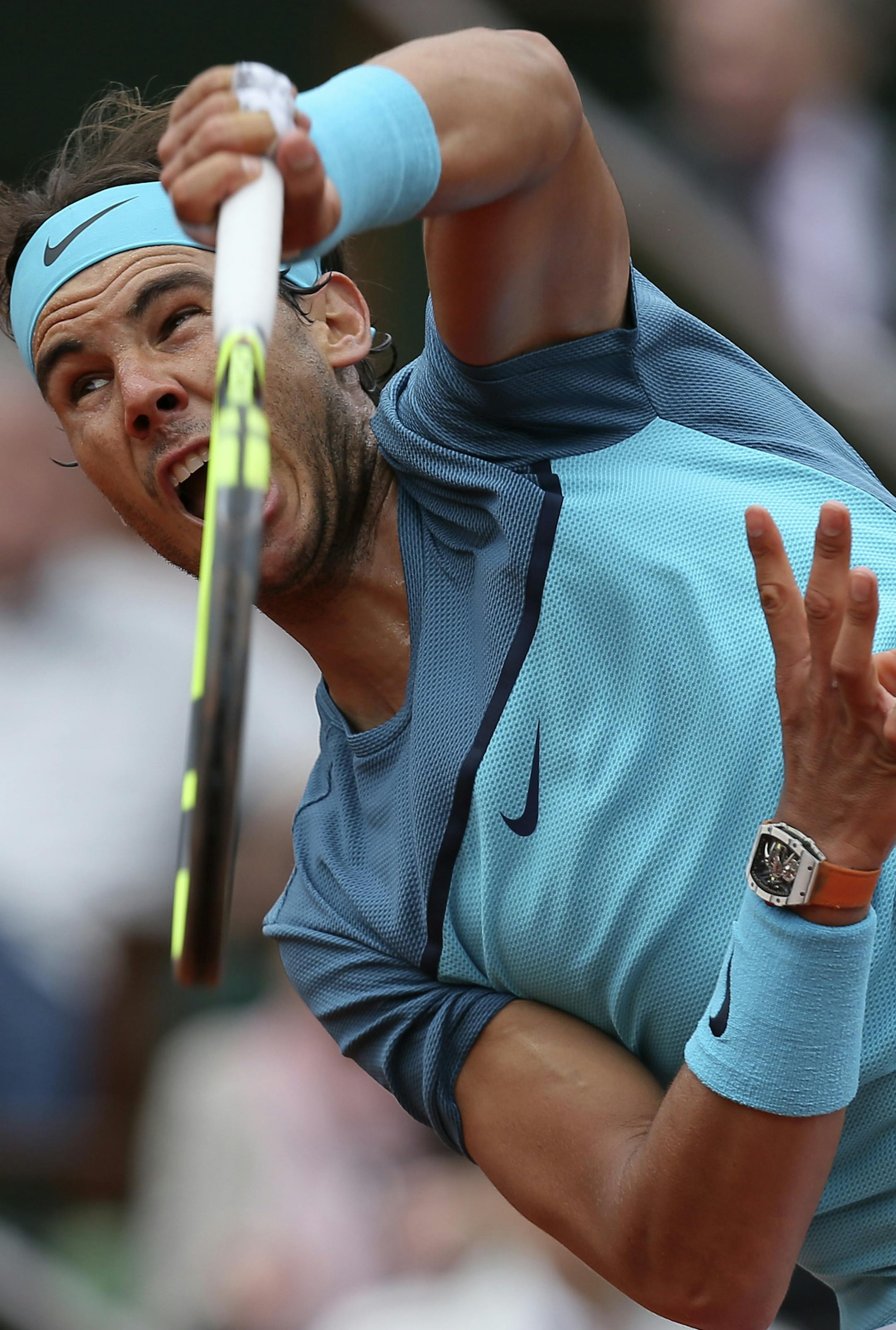 Spain's Rafael Nadal serves the ball to Argentina's Facundo Bagnis during their second round match of the French Open tennis tournament at the Roland Garros stadium, Thursday, May 26, 2016 in Paris. Nadal won 6-3, 6-0, 6-3. (AP Photo/David Vincent)