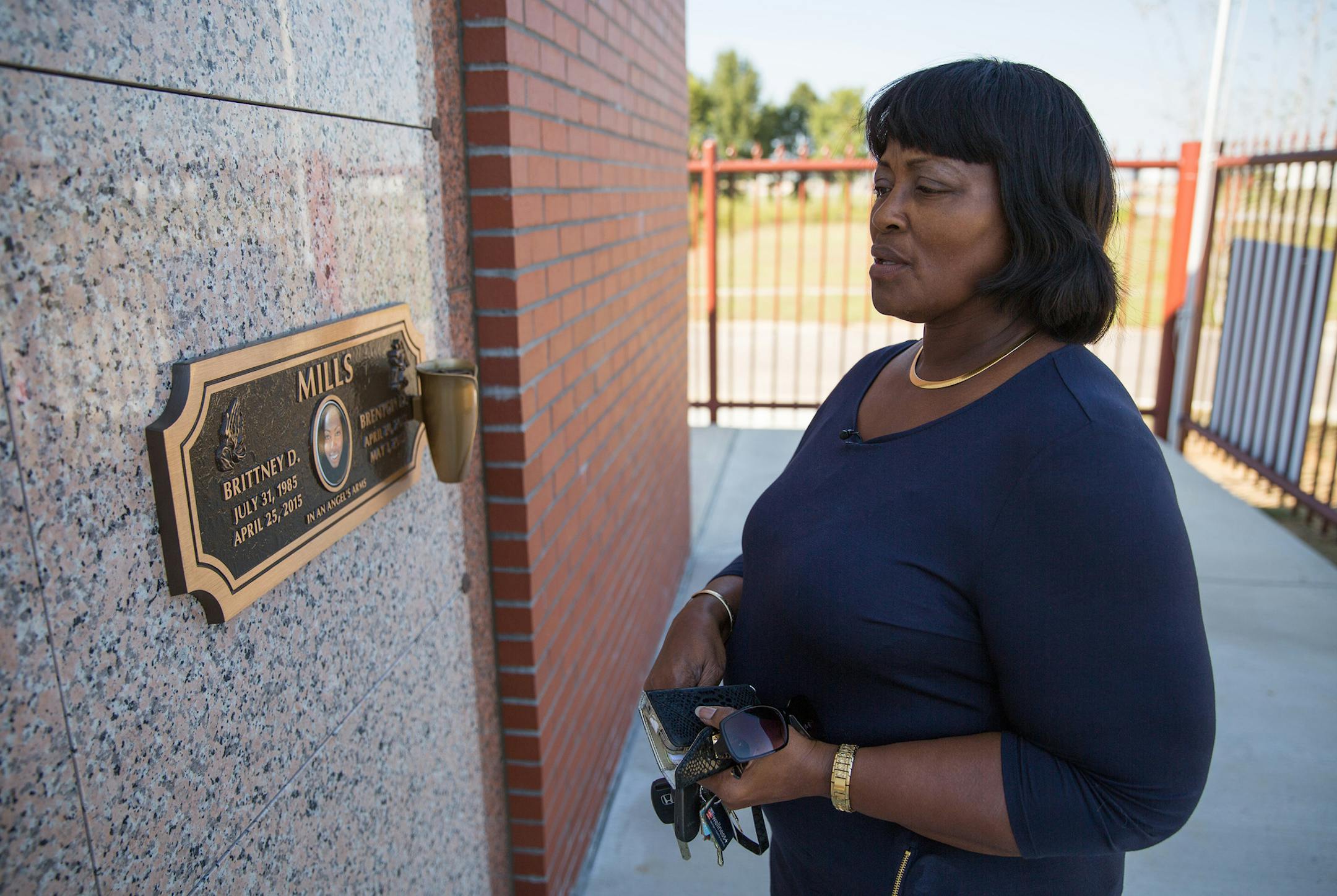 Brittney's mother at the cemetery. (Photo by Matt Anzur)