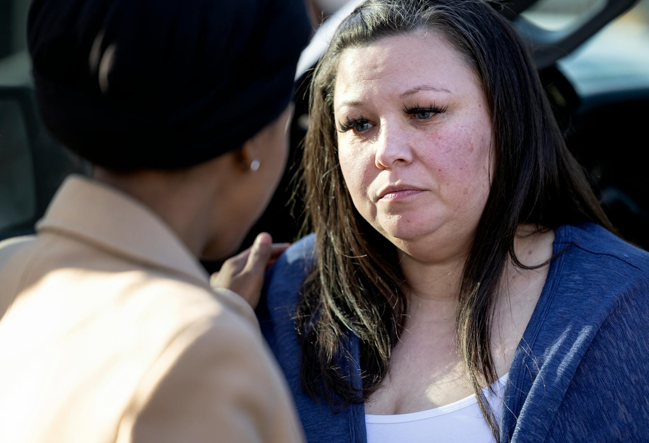 Katie Wright, mother of Daunte Wright, talks with Rep. Ilhan Omar at a Vigil honoring Daunte Wright on one-year anniversary of his death Monday, April 11, in Brooklyn Center, Minn.