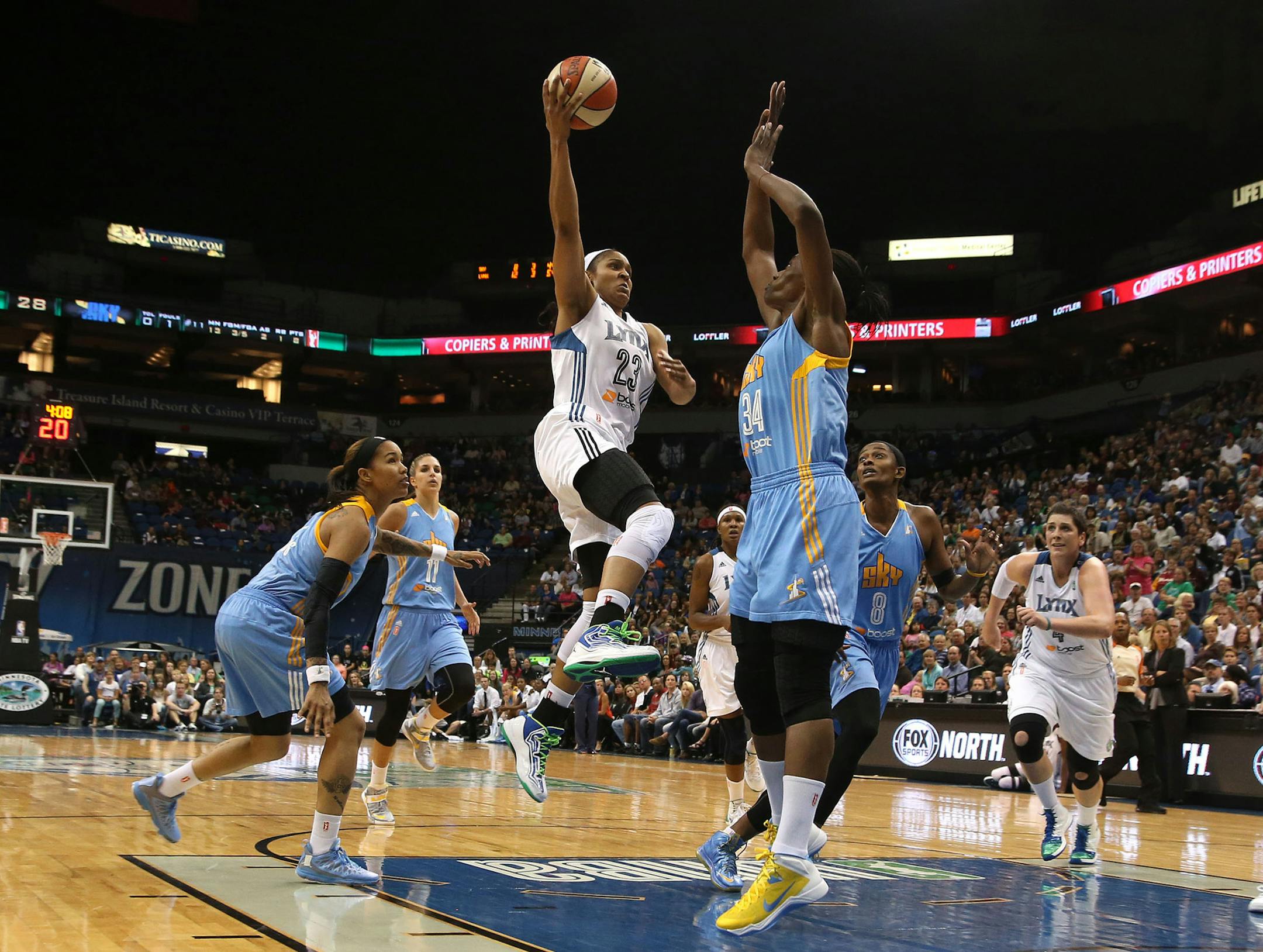 Lynx Maya Moore made a layup in the paint against the Sky’s Sylvia Fowles during the first half