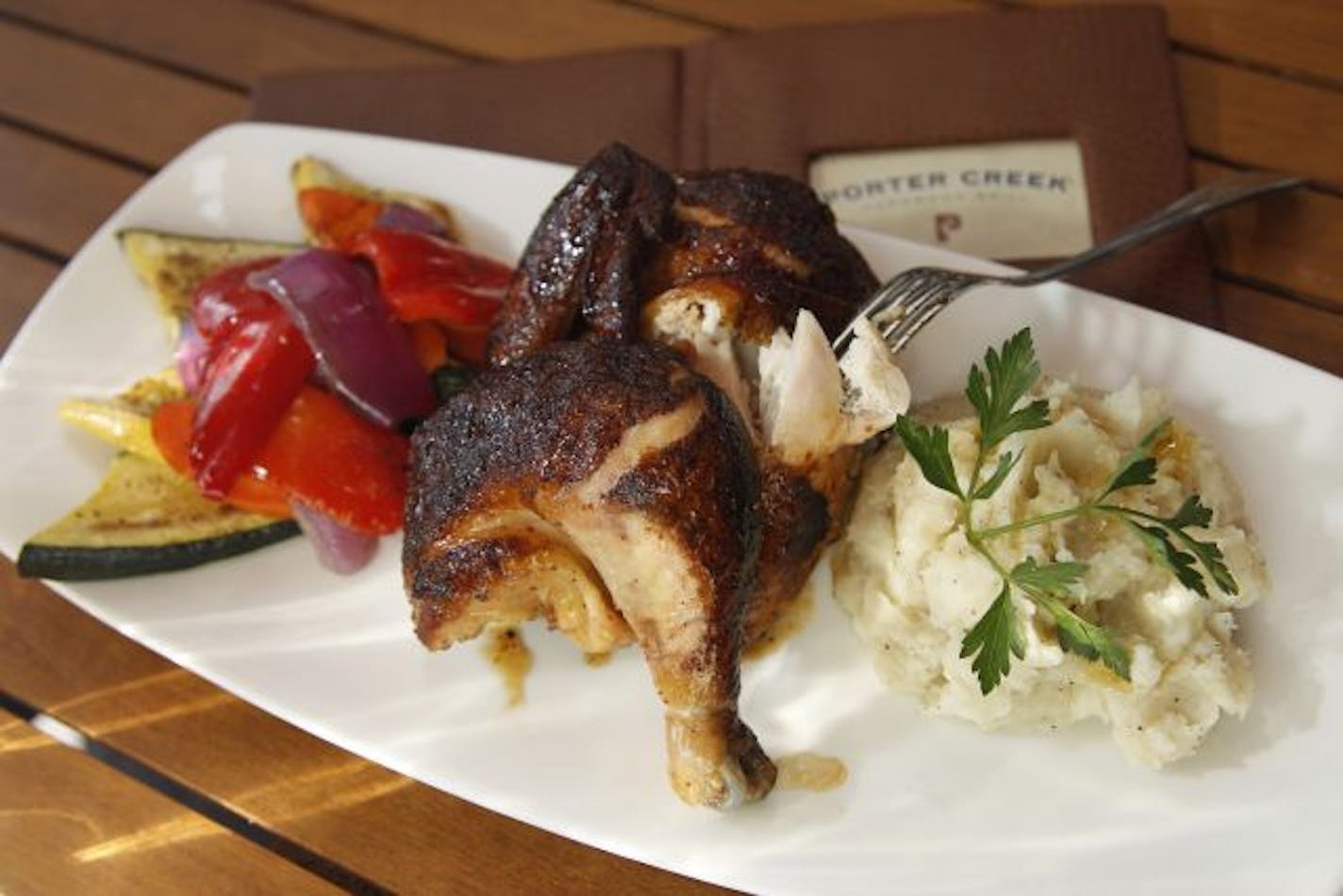 Crispy skinned roasted chicken with mashed potatoes, a bargain at $15.50.