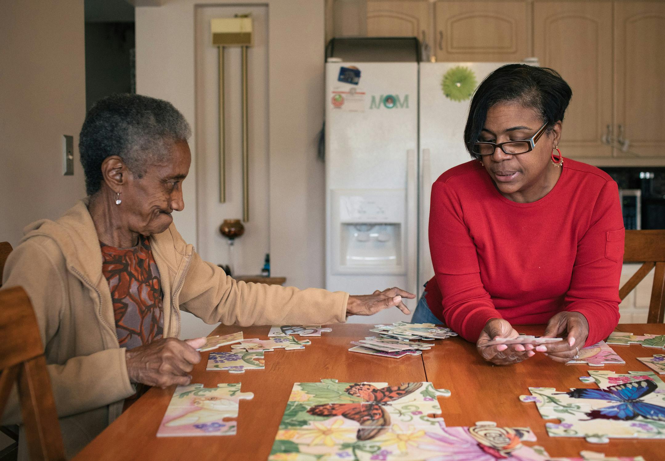 Alantris Muhammad said she found puzzles a helpful brain and dexterity exercise for her mom. MUST CREDIT: photo for The Washington Post by Alyssa Schukar.