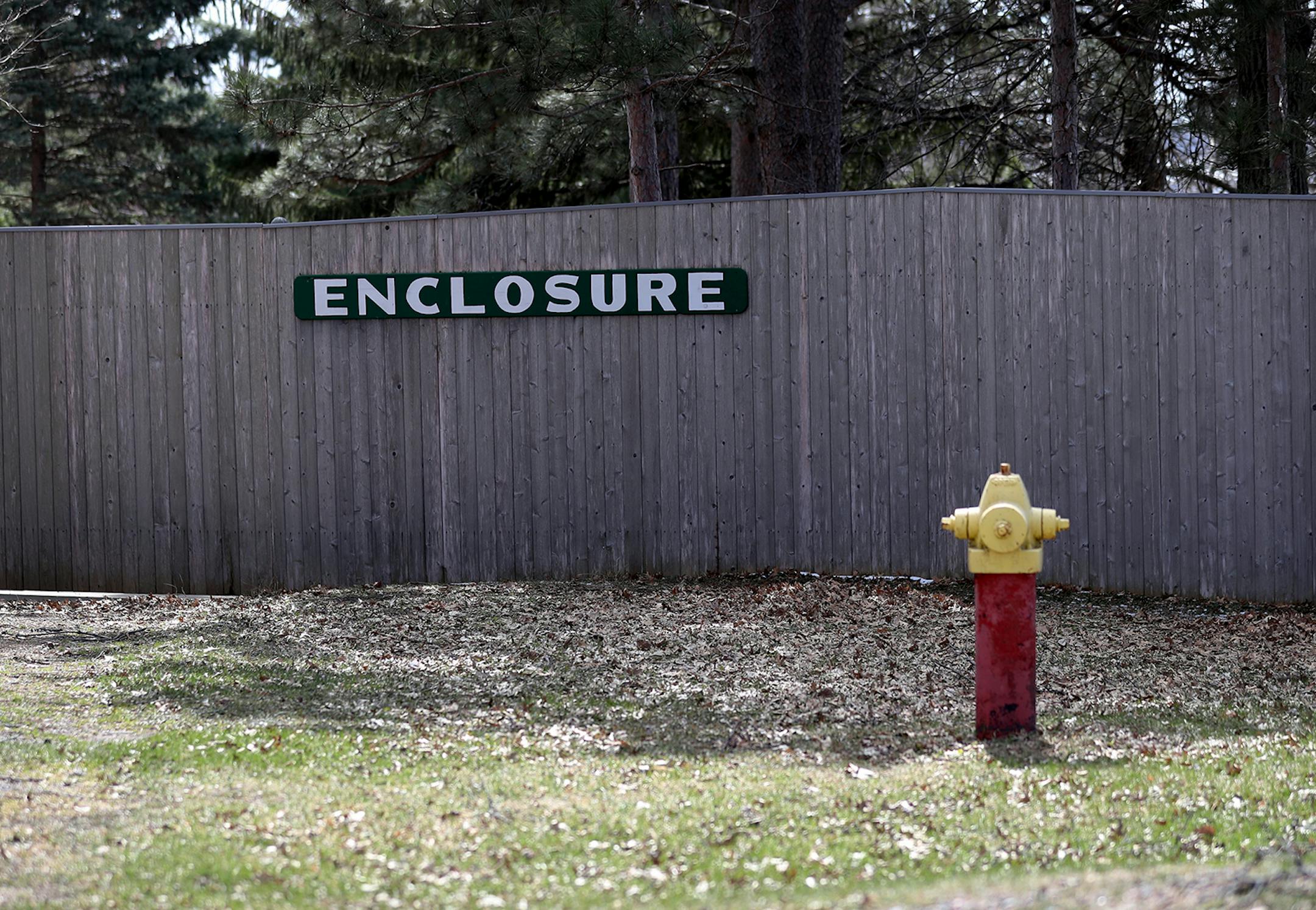 A large wooden fence rings the Poor Clare Nuns of St. Clare's Monastery on Thursday, April 16, 2020, in Sauk Rapids, MN. Poor Clare nuns of St. Clare's Monastery nuns met with journalists in the monastery's parlor, the one room where outsiders have partial access to the nuns in a room divided by a metal lattice with a folding wooden divider.