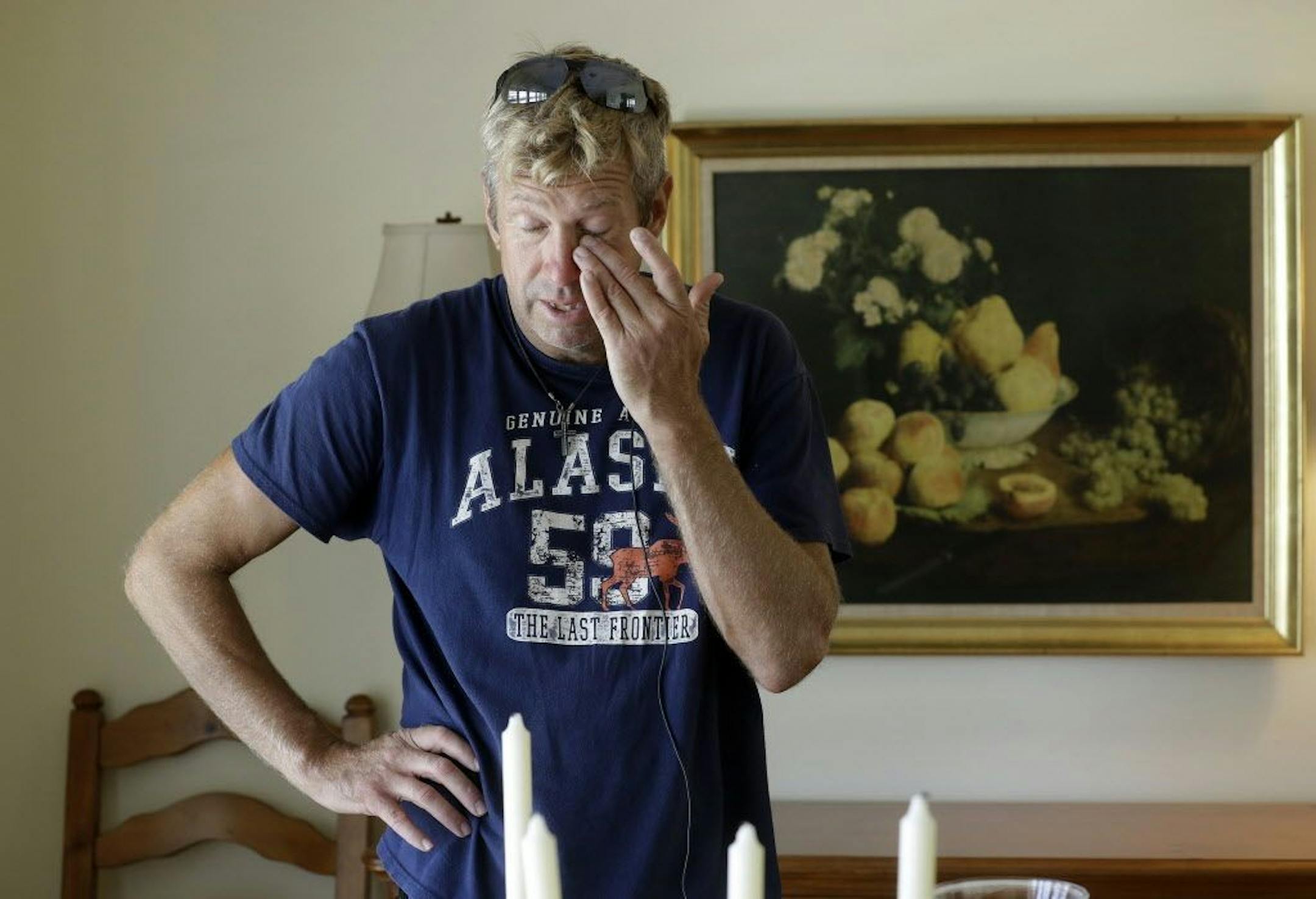 Steve Knowlton wipes his eyes as he talks about his mother Mary Knowlton during an interview Wednesday, Aug. 10, 2016, in Punta Gorda, Fla. Police say an officer accidentally shot Mary to death during a citizen's academy "shoot/don't shoot" exercise Tuesday evening.