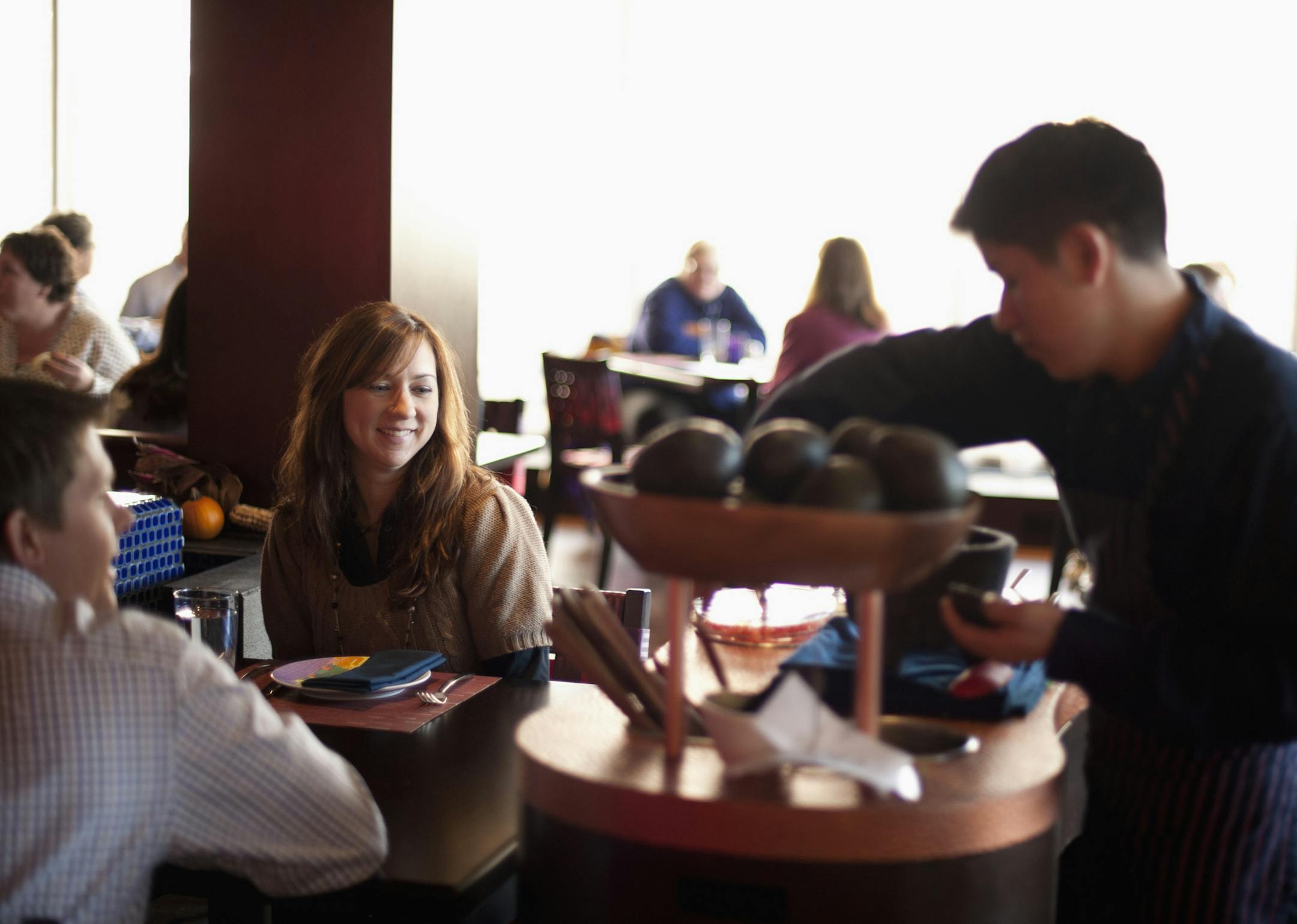 Jamie Wolle and Stacy Clark watched as guacamole was made fresh at their table at Rosa Mexicano on Hennepin Ave. ] GLEN STUBBE * gstubbe@startribune.com