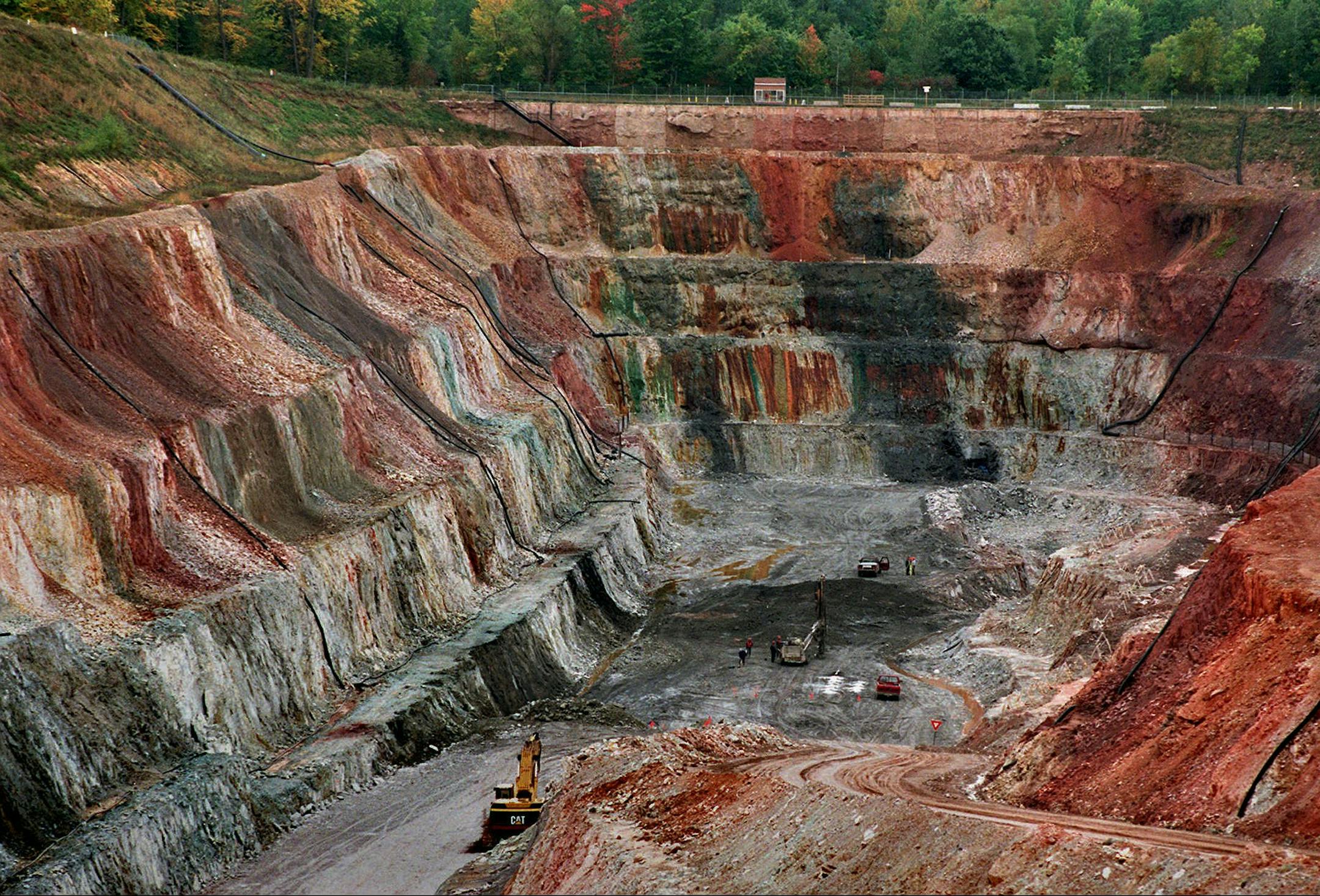 ADVANCE FOR MONDAY FEB. 10, 2014-File - In this September 1996 file photo, the Flambeau open pit copper mine is shown in Ladysmith, Wis. While Minnesota lawmakers debate whether the state of Minnesota should allow PolyMet Mining Corp. to build the state's first copper-nickel mine, the big issue is whether the company can provide sufficient financial assurances to cover the costs for cleaning it up after it closes. The Flambeau Mine, which operated from 1993-97, was filled in, replanted and turne