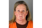 FILE - This file booking photo provided by the Hennepin County, Minn., Sheriff shows Kim Potter, a former Brooklyn Center, Minn., police officer. The 
