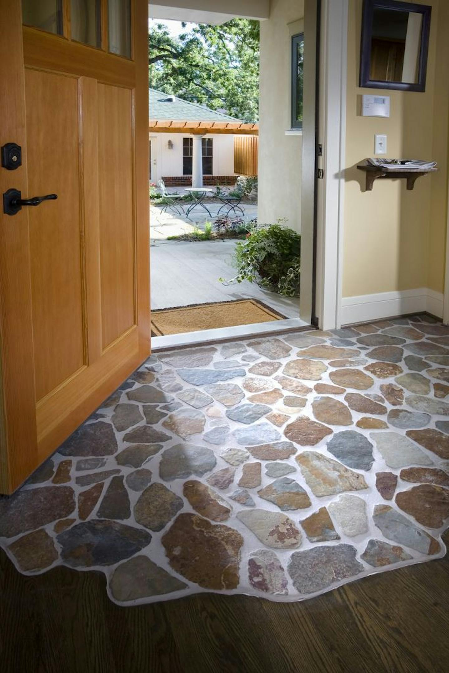 Andrea Rugg Photography for Michael Anschel
Back door of house showing detail of stone tile work inside