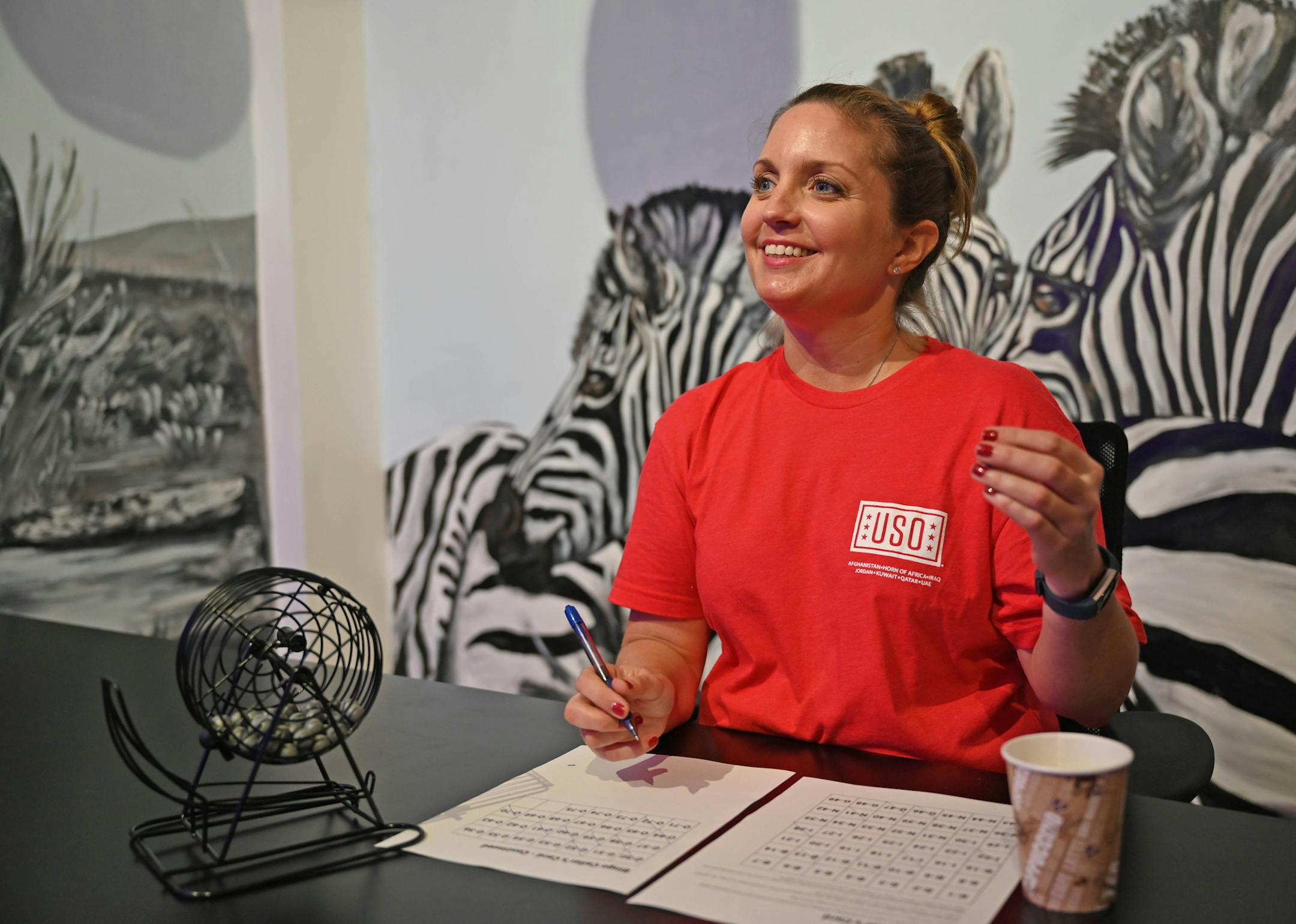 Cpl. Kayla Lystad received a bonus in her care package — USO swag, plus a pair of Apple AirPods and a gift certificate to Lowe's.