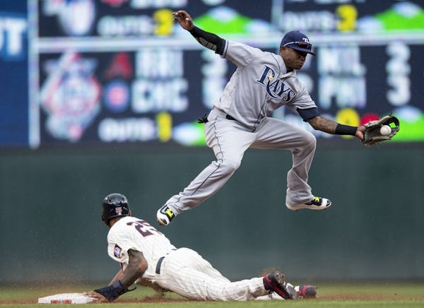 Minnesota Twins center fielder Byron Buxton (25) stole second as Tampa Bay Rays second baseman Tim Beckham (1) was unable to make the tag in the botto